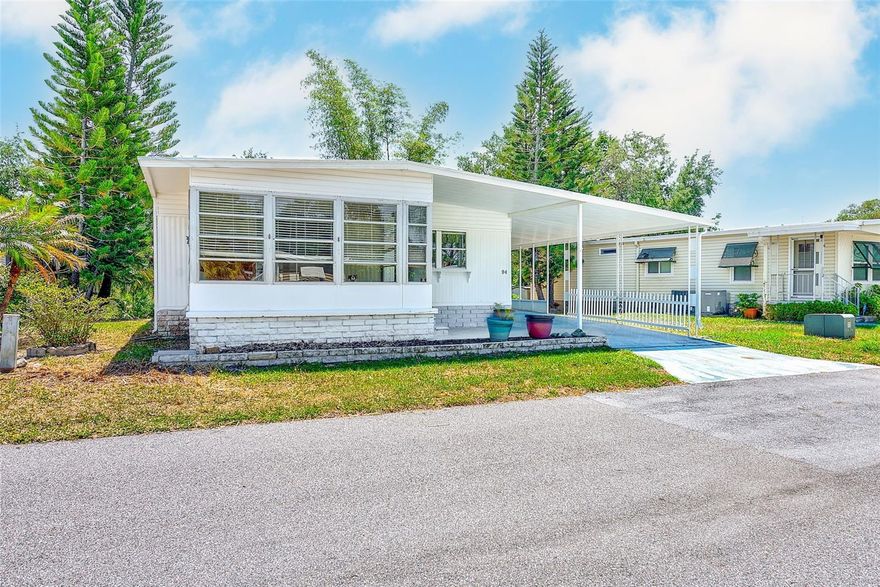 Nestled in one of Safety Harbor's most welcoming active adult communities, this charming two-bedroom, two-bathroom home offers the perfect blend of comfort, convenience, and carefree living. With no rear neighbors, you'll enjoy a sense of privacy and openness that's hard to come by. Step inside to discover a generous living room that flows seamlessly into a spacious dining area, creating an inviting atmosphere for both relaxing and entertaining. The kitchen features a brand new stainless steel dishwasher and its own eat-in nook, ideal for casual morning coffee. The primary bedroom boasts an ensuite bathroom and an impressively large walk-in closet, while the second bedroom offers equally generous proportions. Ample closet space throughout keeps everything neatly organized, and a dedicated storage area with washer and dryer hookups adds everyday practicality. Major updates have already been handled — the roof and air conditioning system were both replaced in 2021, giving you peace of mind for years ahead. This golf cart friendly community keeps monthly fees refreshingly low while covering water, sewer, trash pickup, lawn maintenance, and full access to a clubhouse complete with pool, spa, shuffleboard courts, and a vibrant calendar of activities. Small pets are also welcome. The surrounding neighborhood places you minutes from downtown Safety Harbor's eclectic shops and restaurants, scenic waterfront parks, top-rated medical facilities, and a quick drive to the stunning Gulf beaches. If you've been searching for low-maintenance living wrapped in warmth and community spirit, schedule your private tour today.