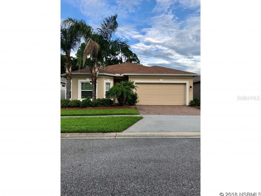 Open floor plan, split bedrooms, large kitchen with island, large bathrooms and large deep closets.  Screened lanai overlooking pond.  Hurricane shutters