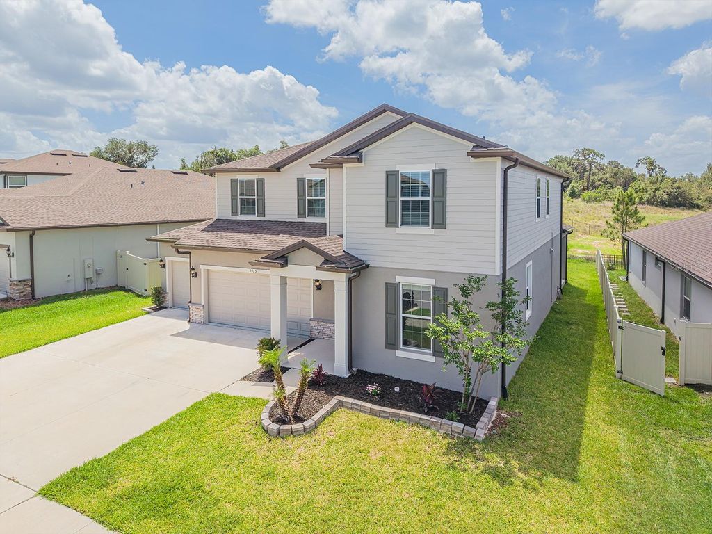 Photo of 9475 Ibis Grove Boulevard, Wesley Chapel, FL 33545 (MLS # TB8512326)