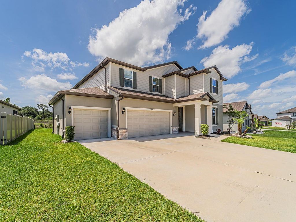Photo of 9475 Ibis Grove Boulevard, Wesley Chapel, FL 33545 (MLS # TB8512326)