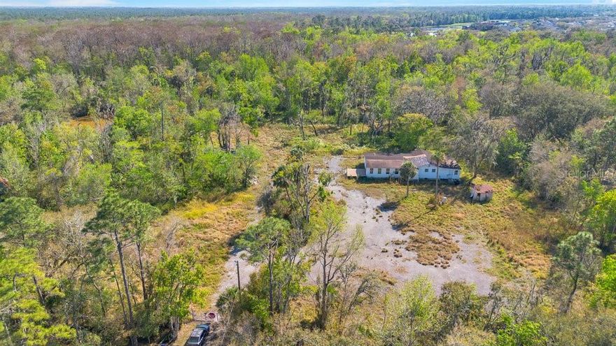 Over 12.5 acres of land! The property has two ponds and natural trails. End of the street lot providing privacy! Limits with the Echonolohatchee river on the east. Close to UCF and the Waterford commercial area. 30 minutes to beach towns, 30 minutes to downtown Orlando.