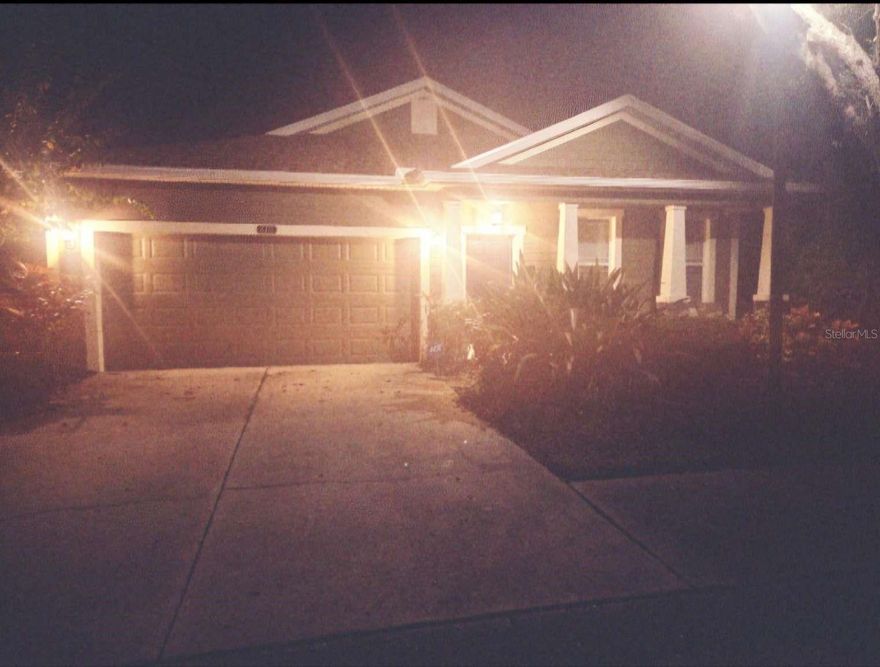 3 bedroom, 2 bath single family home in Palmer Oaks community in Sarasota. New roof, new gutters, new A/C and new refrigerator. Located on a quiet and shaded lot with a tree-lined street. Watch the sunrise on the covered front porch, and watch the sunset across the lighted fountain pond view from screened lanai and master bedroom. Never mow the grass again as HOA includes neighborhood maintenance and lawn/sprinkler care. House has 2 main living room areas for privacy, and the Kitchen is equipped with stainless steel appliances and granite countertops and island. Primary bedroom has a walk-in closet with a granite double vanity with a separate tub and shower. Tile floors throughout main areas with carpeted bedrooms. Attached two car garage opens to the separate laundry room. Gated community, sidewalks, private lakes, and fountains throughout the neighborhood. Newly resurfaced heated pool has loungers and bathrooms along with a covered area and palm trees for shade. Walking distance to grocery stores, shops and restaurants. A short bike ride to the Legacy bike trail. A few minutes to I-75 and 15 minutes to Siesta Key.