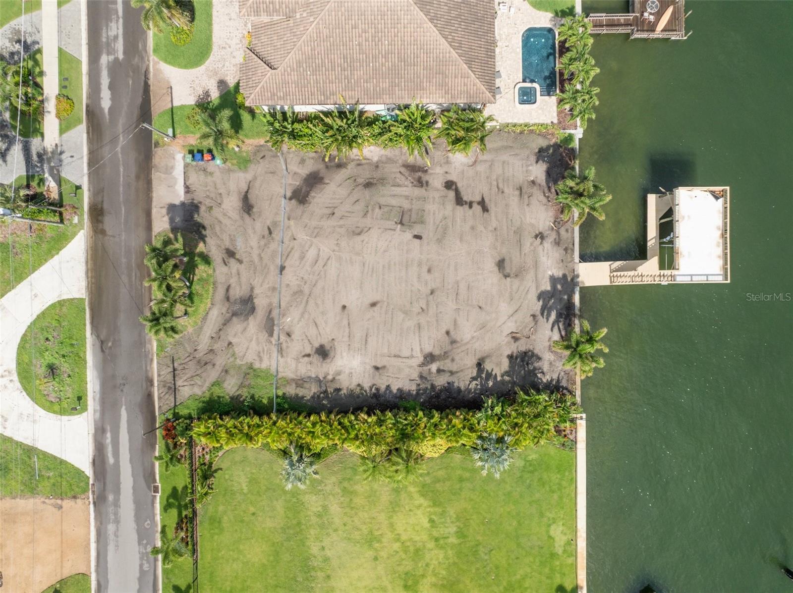 Just recently demolished a single-story home. Lot 7 ft above sea level!!! Waterfront Lot is ideally located in the highly sought after Sunset Park Isles neighborhood, featuring the widest deep-water canal in South Tampa. Canal is 240 feet wide with estimated depth of over 15 ft. This property is a boaters dream location, with no restrictions on the size of the boat you desire, just 3 minutes from open water! Property features a two-story grandfathered in boat dock and lift. Make an appointment today to come and see this once in a lifetime waterfront property!! Lot size 95 x 130...95ft Waterfront