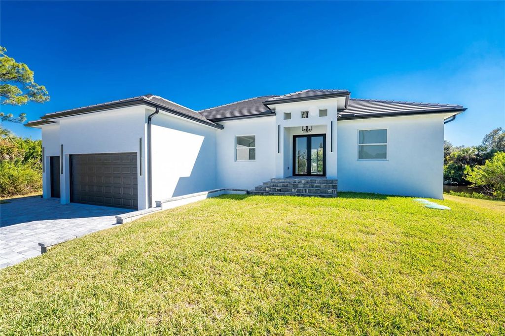 Photo of 576 Mcdill Drive, Port Charlotte, FL 33953 (MLS # C7517494)