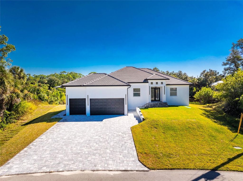 Photo of 576 Mcdill Drive, Port Charlotte, FL 33953 (MLS # C7517494)