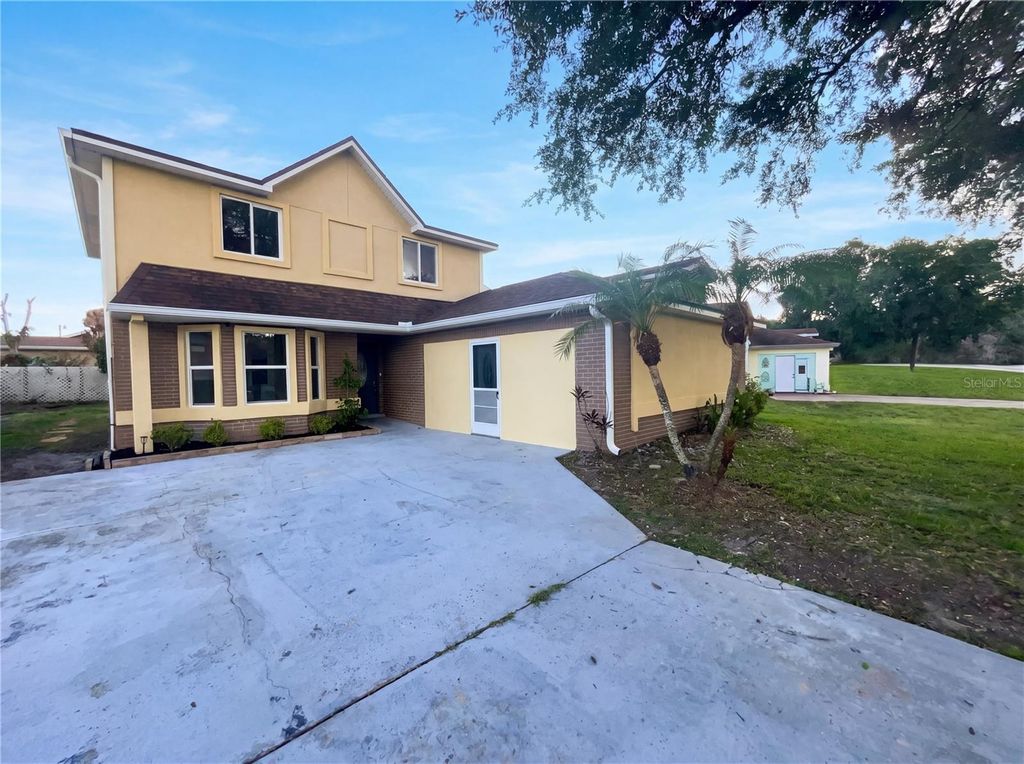 Photo of 147 Coralwood Circle, Kissimmee, FL 34743 (MLS # O6410765)