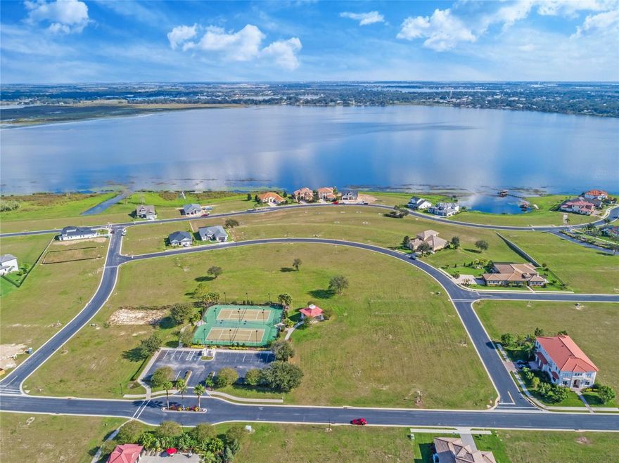 Welcome to the Water Ridge Community the perfect canvas for your dream home! This vacant residential lot, nestled within a secure gated HOA community, offers an ideal foundation for your vision. Enjoy the perks of a thriving community with amenities such as multiple tennis court, pools, boat ramps, gym facilities, boat/RV storage, 3 lakes, community fishing docks and a beautiful club house. Seize the opportunity to build your custom oasis in this sought-after neighborhood, where tranquility meets convenience. Don't miss out on the chance to create your own slice of paradise - schedule your showing today!