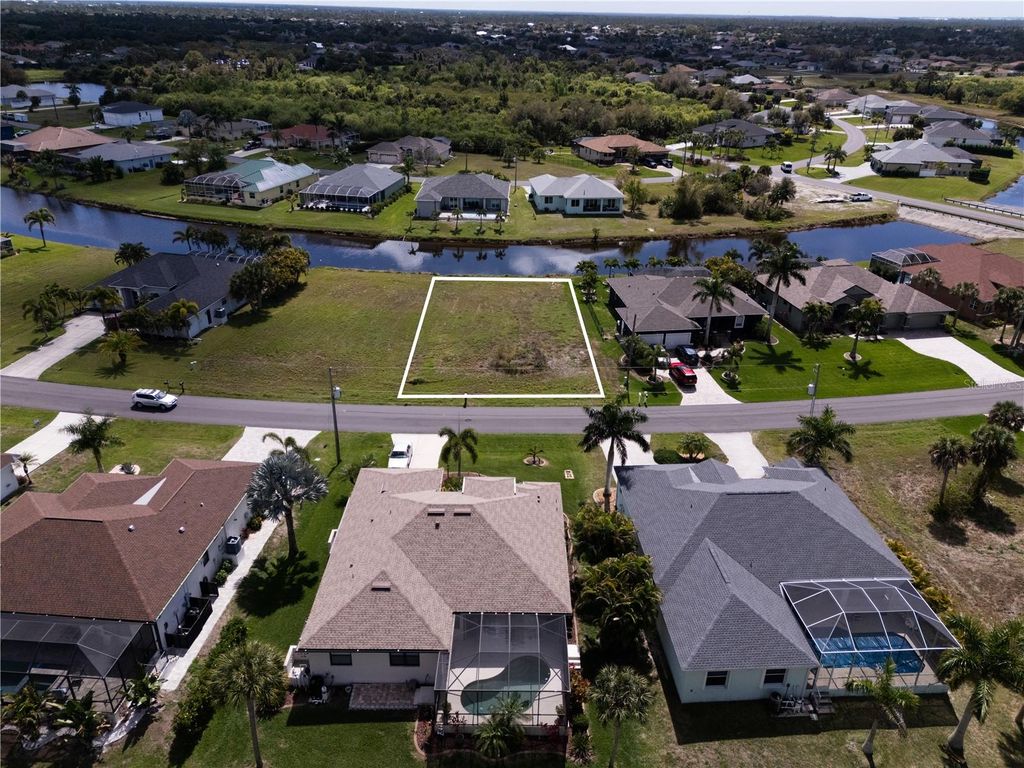 Photo of 134 White Marsh Lane, Rotonda West, FL 33947 (MLS # A4687935)