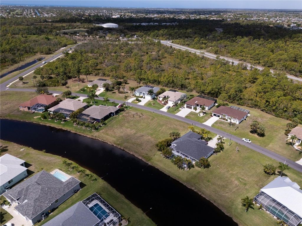Photo of 134 White Marsh Lane, Rotonda West, FL 33947 (MLS # A4687935)