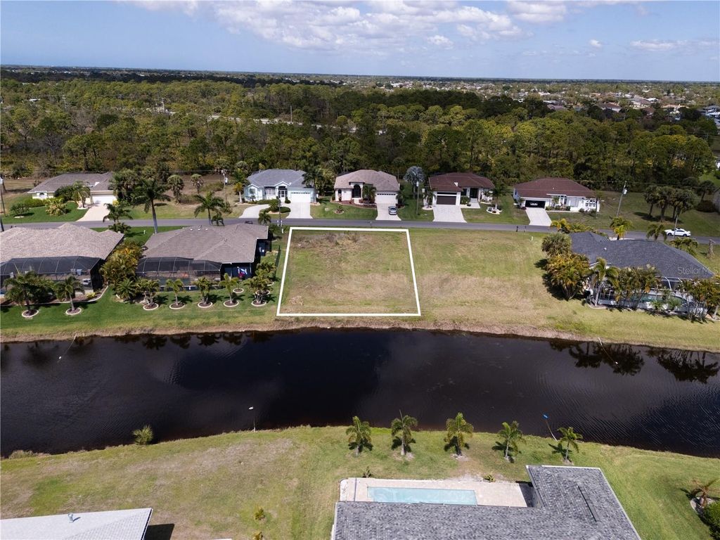 Photo of 134 White Marsh Lane, Rotonda West, FL 33947 (MLS # A4687935)