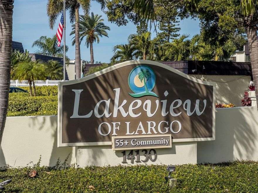 QUIET, CHARMING & PERFECTLY TUCKED AWAY…. This beautifully maintained 2-Bedroom, 1½-Bath Condo is a rare find in the highly desirable Lakeview of Largo community. With NO ASSESSMENTS, ALL INSPECTIONS ALREADY COMPLETED AND A NEWER ROOF, this home offers peace of mind and true move-in-ready convenience. This end-unit style residence has no condos on either side, adding extra privacy and quiet enjoyment. Inside, you will find newer hurricane-impact windows, updated appliances, an upgraded electric panel with extra slots, ceiling fan in the kitchen, and tile flooring throughout for easy maintenance and a clean, cohesive look. The spacious Great Room flows seamlessly into the fully opened Florida Room, creating a bright and inviting living space anchored by a stunning picture window, overlooking the beautifully landscaped courtyard, with views of the heated pool, hot tub, and clubhouse. The condo is light, bright, and welcoming—just bring your clothes and toothbrush and start enjoying the Florida lifestyle.  Additional conveniences include a laundry room on each floor, dedicated storage for each unit, and low monthly maintenance fees that include all amenities and cable. Most furniture is negotiable or can be removed at the buyer’s request, making this home adaptable to your needs.  Lakeview of Largo is a very active 55+ community, offering a wide variety of activities, games, and social events, along with a library and book clubs. Residents also enjoy three pools throughout the complex.  Ideally located near shopping, restaurants, and a Publix just down the street, with easy access to Ulmerton/Walsingham Road.  Lakeview of Largo is perfectly situated for quick trips to the Gulf beaches, Tampa International Airport, and even a short drive to Orlando.All measurements are approximate. Buyer to verify.