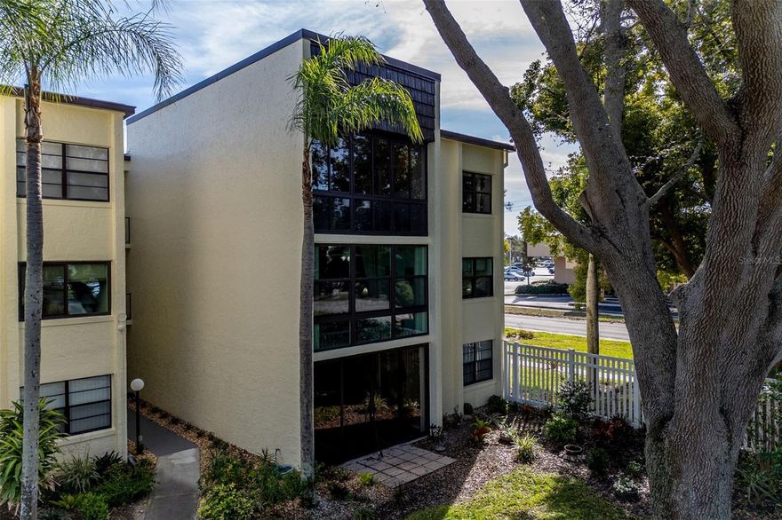 QUIET, CHARMING & PERFECTLY TUCKED AWAY…. This beautifully maintained 2-Bedroom, 1½-Bath Condo is a rare find in the highly desirable Lakeview of Largo community. With NO ASSESSMENTS, ALL INSPECTIONS ALREADY COMPLETED AND A NEWER ROOF, this home offers peace of mind and true move-in-ready convenience. This end-unit style residence has no condos on either side, adding extra privacy and quiet enjoyment. Inside, you will find newer hurricane-impact windows, updated appliances, an upgraded electric panel with extra slots, ceiling fan in the kitchen, and tile flooring throughout for easy maintenance and a clean, cohesive look. The spacious Great Room flows seamlessly into the fully opened Florida Room, creating a bright and inviting living space anchored by a stunning picture window, overlooking the beautifully landscaped courtyard, with views of the heated pool, hot tub, and clubhouse. The condo is light, bright, and welcoming—just bring your clothes and toothbrush and start enjoying the Florida lifestyle.  Additional conveniences include a laundry room on each floor, dedicated storage for each unit, and low monthly maintenance fees that include all amenities and cable. Most furniture is negotiable or can be removed at the buyer’s request, making this home adaptable to your needs.  Lakeview of Largo is a very active 55+ community, offering a wide variety of activities, games, and social events, along with a library and book clubs. Residents also enjoy three pools throughout the complex.  Ideally located near shopping, restaurants, and a Publix just down the street, with easy access to Ulmerton/Walsingham Road.  Lakeview of Largo is perfectly situated for quick trips to the Gulf beaches, Tampa International Airport, and even a short drive to Orlando.All measurements are approximate. Buyer to verify.