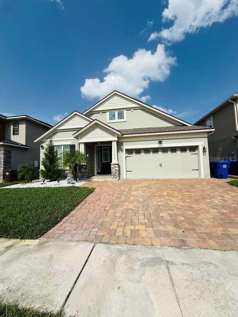 Photo of 2290 Avian Loop, Kissimmee, FL 34741 (MLS # O6415733)