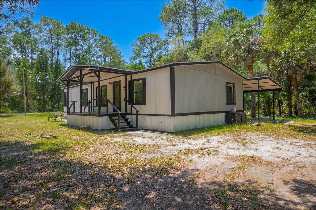Photo of 6550 SE Debra Avenue, Inglis, FL 34449 (MLS # W7885509)