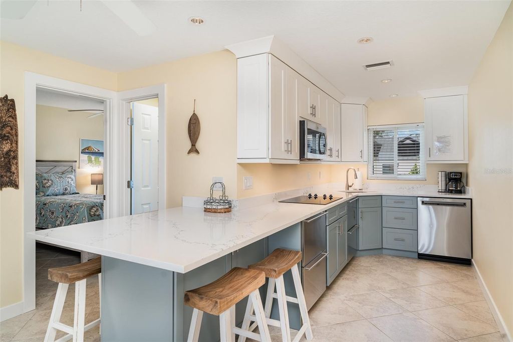 Photo of 2310 Gulf Drive N #104, Bradenton Beach, FL 34217 (MLS # A4655396)