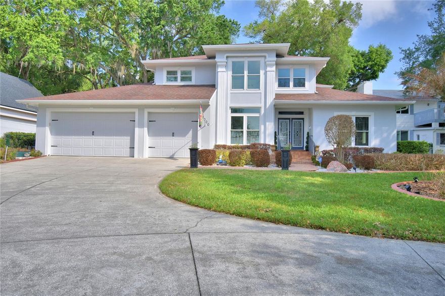 Located on beautiful Lake Ariana, this stunning and meticulously maintained, 3-bedroom, 3-bath, 3-car garage home offers both comfort and style in an exceptional waterfront setting. Porcelain tile runs throughout the home, creating a clean and cohesive look.
The home features a spacious family room, formal living and dining areas, plus a private office that can easily serve as a 4th bedroom, with convenient access to a guest bath. The kitchen is beautifully appointed with granite countertops, wood cabinetry, a double oven, a built in microwave and cooktop—perfect for both everyday living and entertaining.
The laundry room is generously sized and includes a custom-built drop zone for added functionality. Step into the sunporch and enjoy peaceful views of the private backyard, designed for entertaining with a custom fire pit and a unique bi-level layout that adds to its visual appeal.
Upstairs, the owner’s suite is a private haven, boasting an ensuite bath with a walk-in shower, garden tub, double sink vanity, and a water closet equipped with a laundry chute, plus a spacious walk-in closet. Two additional generously sized bedrooms are located just steps away from a tastefully designed bath with quality finishes. 
Enjoy true Florida living with lakefront features that include a screened deck and direct access to your private boathouse, complete with electric, water, and a boat lift.
Recent updates include two new AC units, a new water heater, fresh exterior paint, and a professionally coated garage floor by Tru Grit Coatings—adding both value and peace of mind.
This home is ideally situated near both Interstate 4 and Polk Parkway, offering easy commuting throughout Central Florida.  Enjoy quick access to Florida's beautiful beaches and major attractions. Whether for work, play, or weekend escapes, this location provides easy access to the best of Florida living.