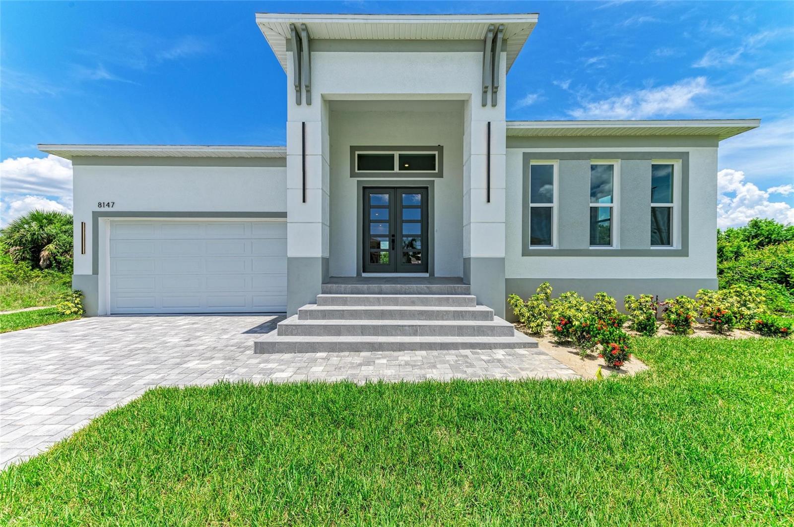 NEW PROPERTY. Welcome to your slice of FLORIDA PARADISE! located in the highly 93 zone in SOUTH GULF COVE . the community have club house, boat ramp, dock, Park, and sidewalk. This stunning 4-bedroom, 3.5-bathroom home is situated on a spacious lot in a peaceful neighborhood, the house is across the street from the canal front in, just minutes from Charlotte Harbor, Englewood and all Gulf Coast Beaches , Boca Grande Island , as well as the marinas Step inside and fall in love with the 12-foot ceilings that create an airy, open feel throughout the sunlit living area in this open-concept home. The modern gourmet kitchen features a central hood with a large island, stainless steel appliances, and a roomy pantry. The primary suite includes a generous walk-in closet and a luxurious bathroom with a classic bathtub.
The house is designed to meet the new flood elevation code and is equipped with impact-resistant glass windows and doors to provide peace of mind. The flooring is 48"x24" porcelain tile throughout the house. Enjoy outdoor living year-round on your open lanai. With NO MANDATORY HOA, this property is perfect for snowbirds, investors, or full-time residents alike. Bring your boat or RV and you can also enjoy your golf car around—you’re close to boat ramps, golf courses, shopping, dining, and I-75 for an easy drive to Sarasota, or Fort Myers and Naple
Your Gulf Coast dream home awaits!