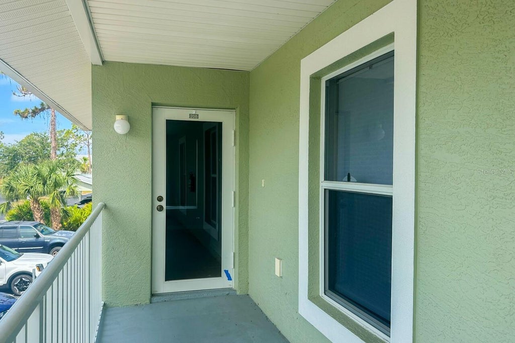 Photo of 8100 Memory Lane #208, Rotonda West, FL 33947 (MLS # D6148508)