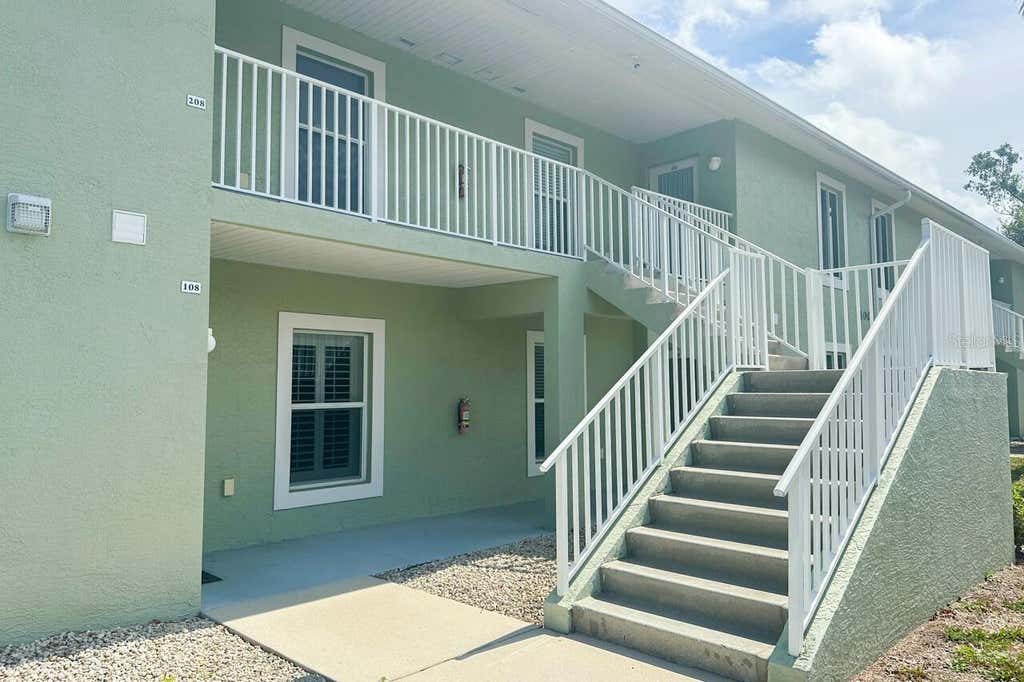 Photo of 8100 Memory Lane #208, Rotonda West, FL 33947 (MLS # D6148508)