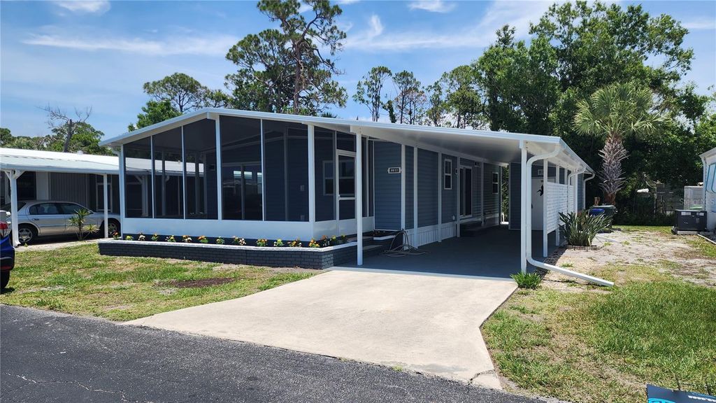 Photo of 190 Pago Pago Lane, Englewood, FL 34223 (MLS # A4652633)