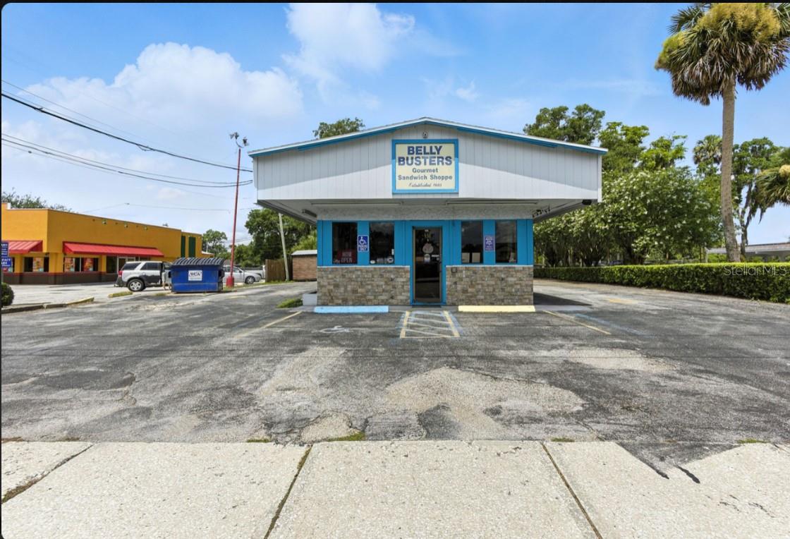 Welcome to a piece of Deland History. This is an exceptional opportunity to own a thriving, well-established restaurant in the heart of DeLand, Florida. Belly Busters Restaurant has been serving the community for over 20 years, consistently drawing in loyal customers and offering a proven business model for success. This turnkey restaurant comes fully equipped with all necessary kitchen and dining equipment, allowing for a seamless transition for new ownership. The business has maintained a strong reputation in the area and offers a unique chance for continued success in a prime, high-traffic location.