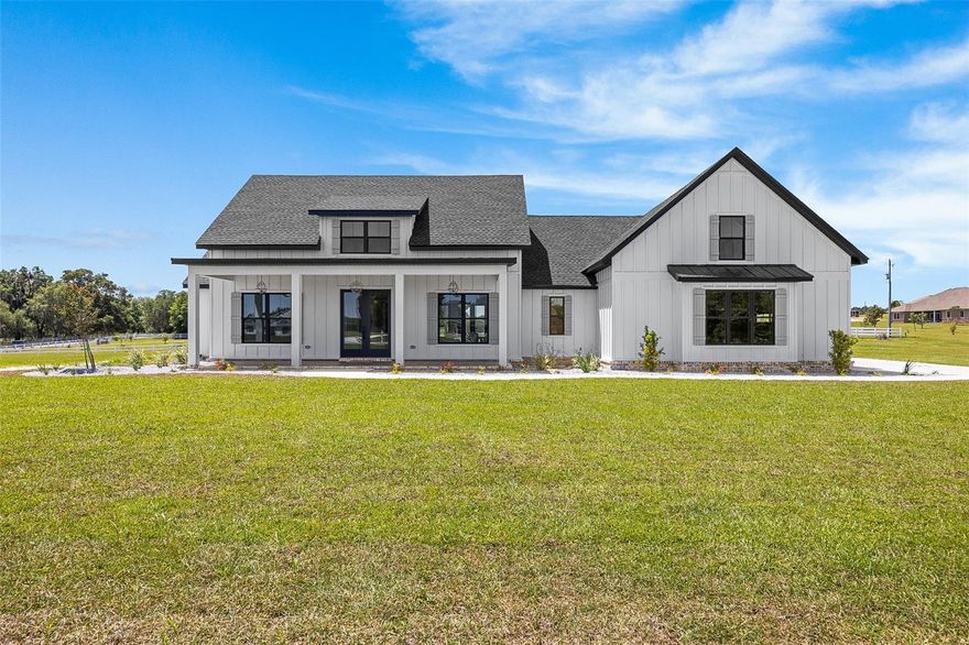 Pre-Construction. To be built. This elegant offering comes on 3.4, equestrian friendly acres in picturesque and convenient location. As you walk in the front you are welcomed by the stunning wood work on the foyer and dining walls. The open kitchen is truly stunning with flush custom cabinetry a large ten-foot island that looks amazing and is functional. The pantry will not disappoint with a sleek barn door and ample shelving. The family room is open and airy with plenty of natural lighting and boasts cathedral ceilings, a beautiful fireplace and built-in shelving. On one end of the split floor plan is two bedrooms and two full bathrooms, one of these rooms having a large walk-in closet and a full bathroom with a door that leads to the back patio. On the opposite end of the home is the primary suite with more eye-catching woodwork on the back wall and a barn door leading into the primary bathroom. This bathroom is elegantly done with ample functional storage. Off the bathroom is an amazing walk-in closet with built in shelving. Outside of the primary suite is a large laundry room with custom cabinetry and plenty of space.  A staircase by the back entry leads to a large bedroom/office/guest room/etc. This upstairs room has a full bathroom, a large closet, and pretty countryside views. This home is conveniently located just 10 minutes from your main stores, restaurants and shopping. *Photos are NOT the actual home, but a matching plan by the same builder, Sparks Construction, and represent the finishes offered.