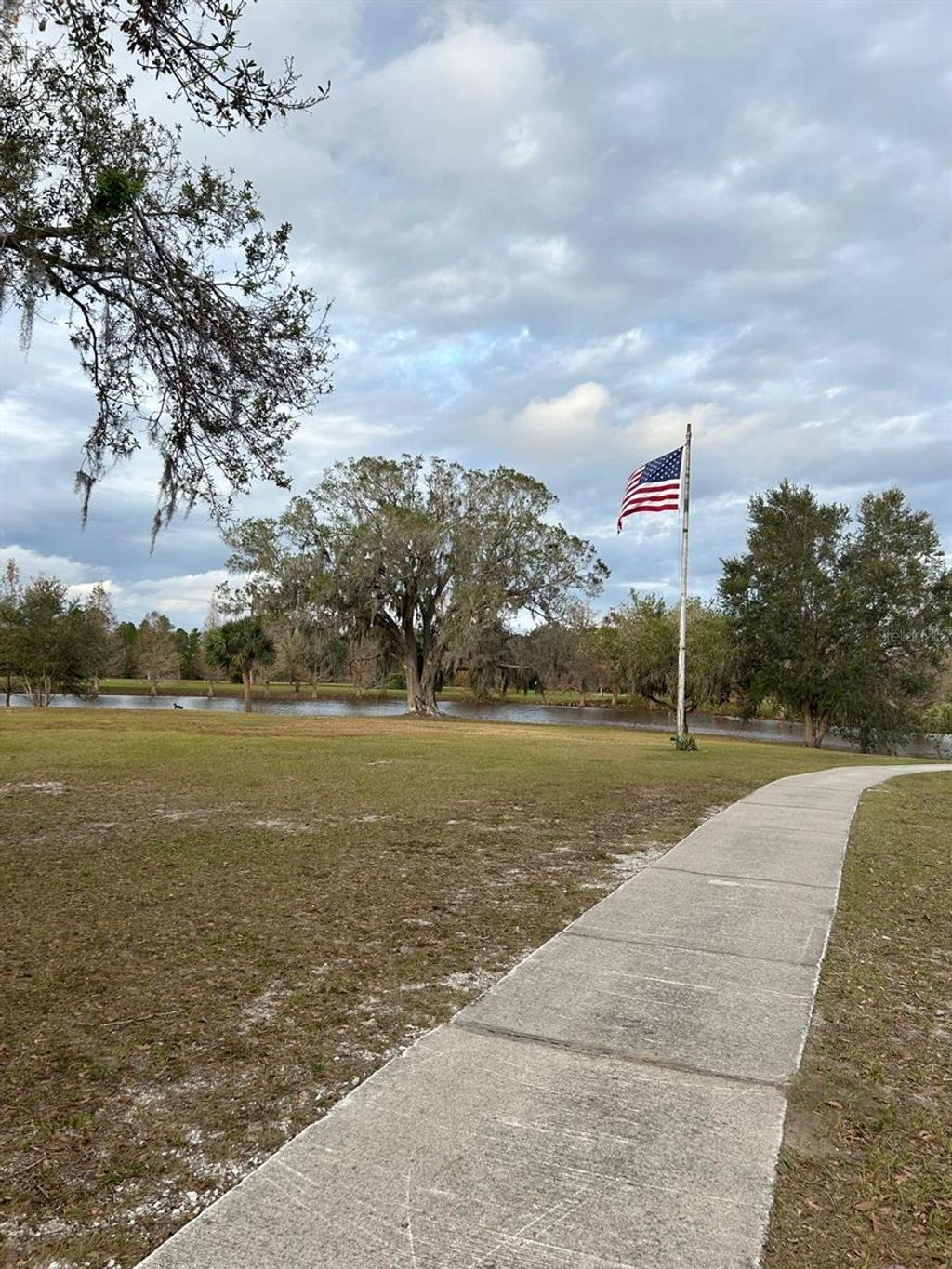 Photo of 107 Hibiscus Drive, Indian Lake Estates, FL 33855 (MLS # TB8352279)