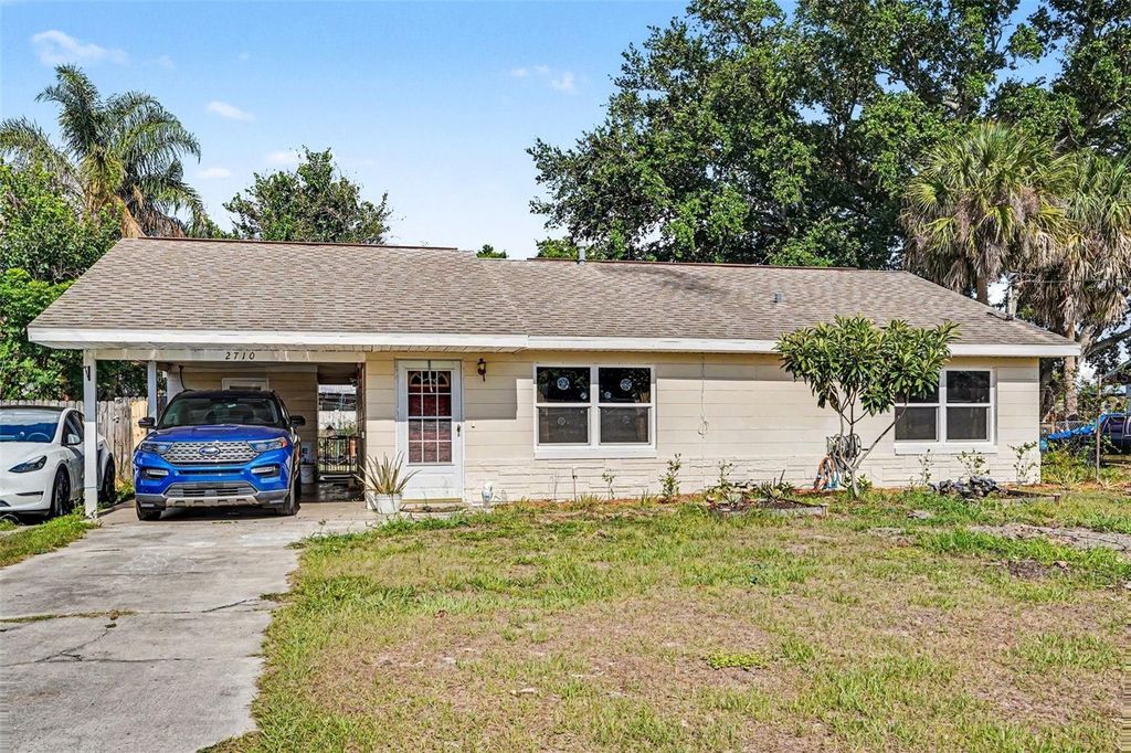Photo of 2710 Woodlawn Drive, Winter Haven, FL 33881 (MLS # TB8511606)