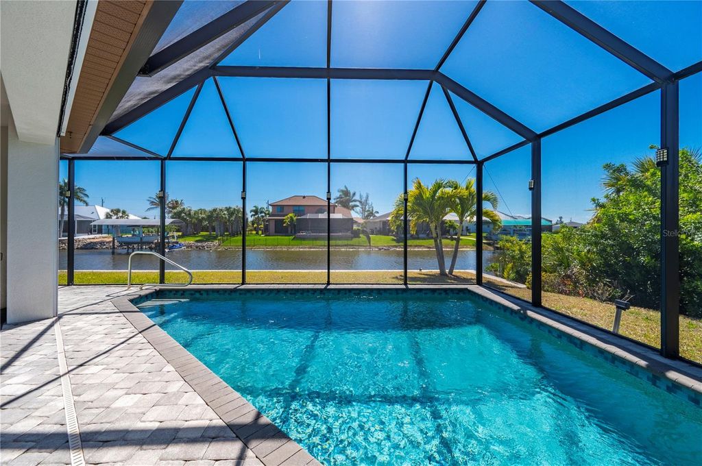 Photo of 15312 Hennipen Circle, Port Charlotte, FL 33981 (MLS # C7522476)