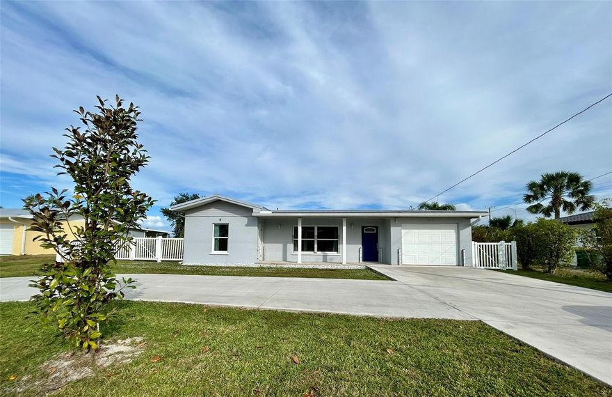 Completely remodeled 3-bedroom, 2-bath home with private dock located in the desirable Punta Gorda Isles! This beautifully updated property features modern finishes throughout, including new flooring, updated kitchen with stainless steel appliances, and stylish bathrooms. The primary suite features a beautiful fireplace. The open floor plan offers penty of natural light and comfortable living space perfect for entertaining or relaxing. Enjoy water access via your private dock - ideal for boating or fishing. Home includes a one-car garage, indoor laundry, and a bonus room perfect for an office. Hurricane impact windows and flood gates if needed.