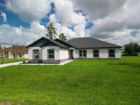Photo of 4095 SW 112th Street, Ocala, FL 34476 (MLS # OM731766)
