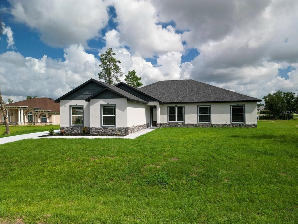 Photo of 4095 SW 112th Street, Ocala, FL 34476 (MLS # OM731766)