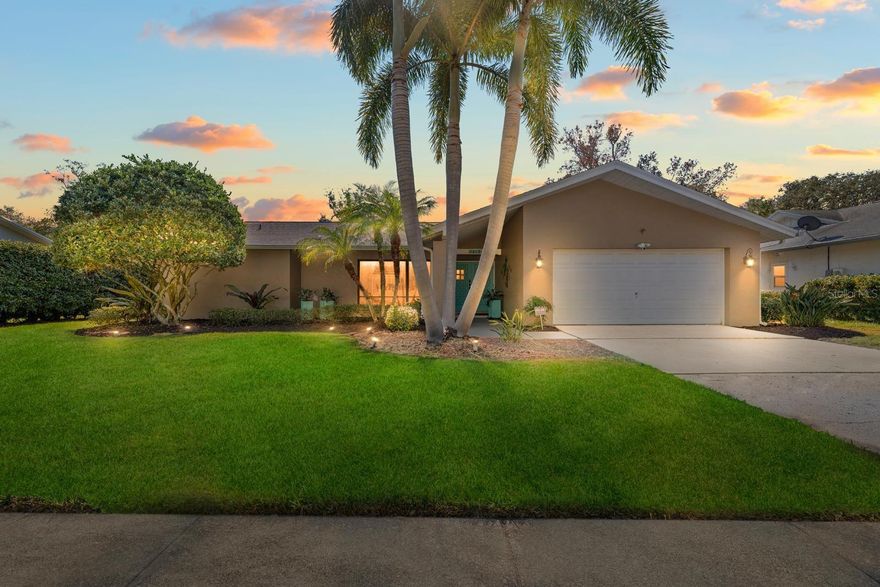 One or more photo(s) has been virtually staged. Absolute perfection awaits at 1812 Pine Hill Drive in Safety Harbor. Meticulously maintained and truly move-in ready, this home offers a thoughtful balance of well-executed interior updates and major system improvements, making it appealing to even the most discerning buyer. The beautifully updated kitchen opens seamlessly to the main living area, showcasing views of the screened-in saltwater pool and ample granite counter space—ideal for both everyday living and entertaining. A cozy wood-burning fireplace, framed by custom floor-to-ceiling built-in shelving, anchors the family room with warmth and character. In addition to the main living space, the home features a formal living room and a versatile second family room or game room, providing flexibility for entertaining, media use, or casual gatherings. The spacious primary suite offers a walk-in closet and peaceful pool views, while the additional bedrooms are generously sized. Hurricane-impact windows have been installed in the bedrooms, adding comfort and peace of mind. Plus, there is a lovely indoor laundry room! Step outside to your private backyard oasis—a screened-in saltwater pool with a new electric pool heater, complemented by an impressive outdoor kitchen complete with a built-in grill, refrigerator, sink, and mounted TV—perfect for hosting year-round. Notable recent upgrades include solar panels (to be paid off at closing), new AC system, new ductwork, new insulation, and an irrigation system, along with numerous thoughtful improvements throughout the home. Centrally located with an easy commute and close to everything Safety Harbor and Tampa Bay has to offer, this home truly checks every box. Schedule your private showing today—this one will not last.