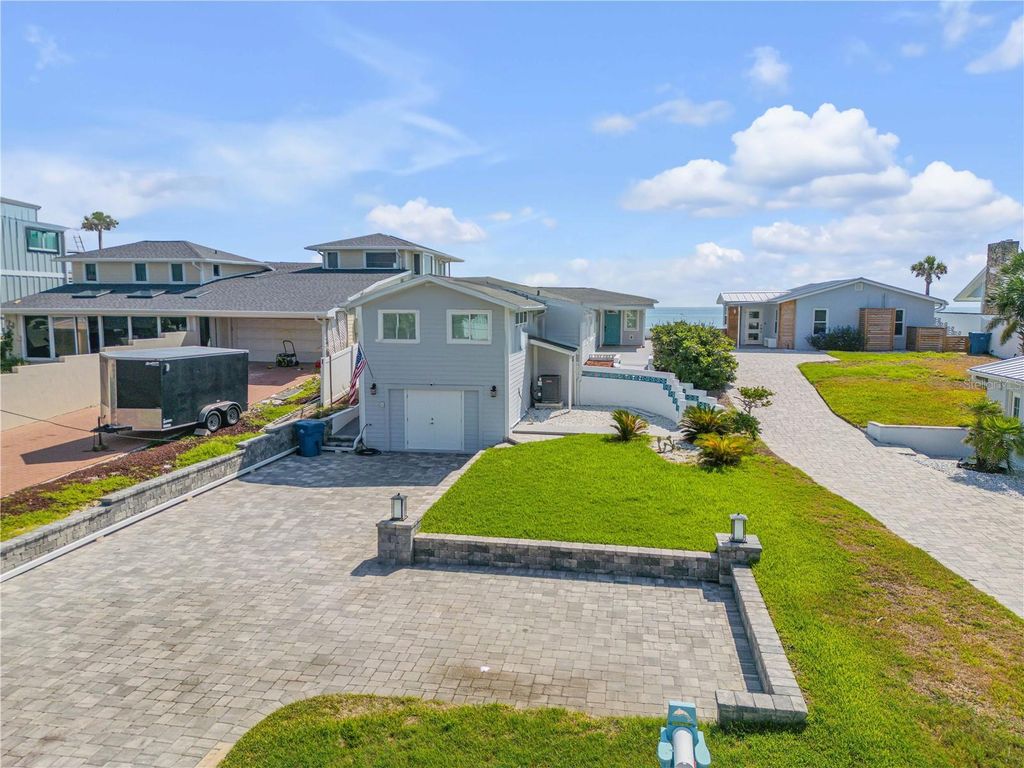 Photo of 4291 S Atlantic Avenue, Port Orange, FL 32127 (MLS # FC318148)