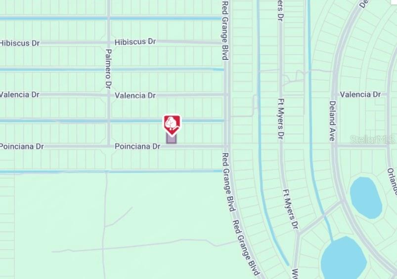 Photo of 12 Poinciana Drive, Indian Lake Estates, FL 33855 (MLS # O6437717)