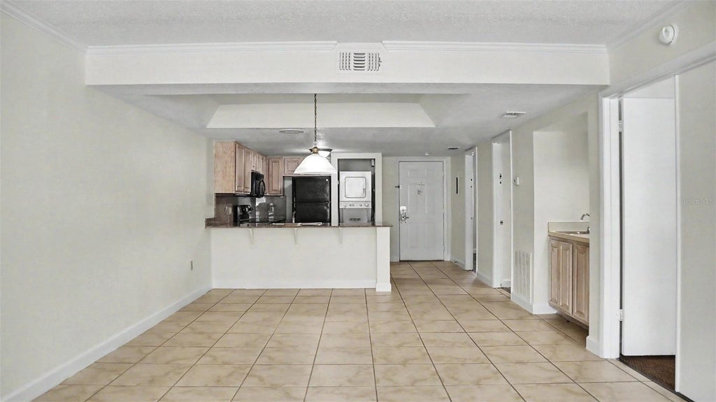Photo of 2791 N Poinciana Boulevard #329, Kissimmee, FL 34746 (MLS # O6453497)