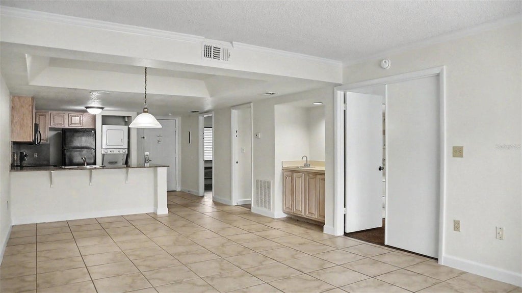 Photo of 2791 N Poinciana Boulevard #329, Kissimmee, FL 34746 (MLS # O6453497)
