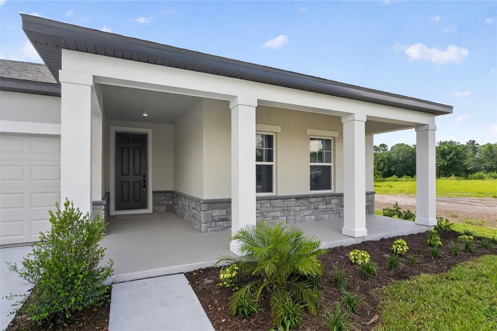 Photo of 1634 Cane Bamboo Drive, Saint Cloud, FL 34771 (MLS # TB8530013)