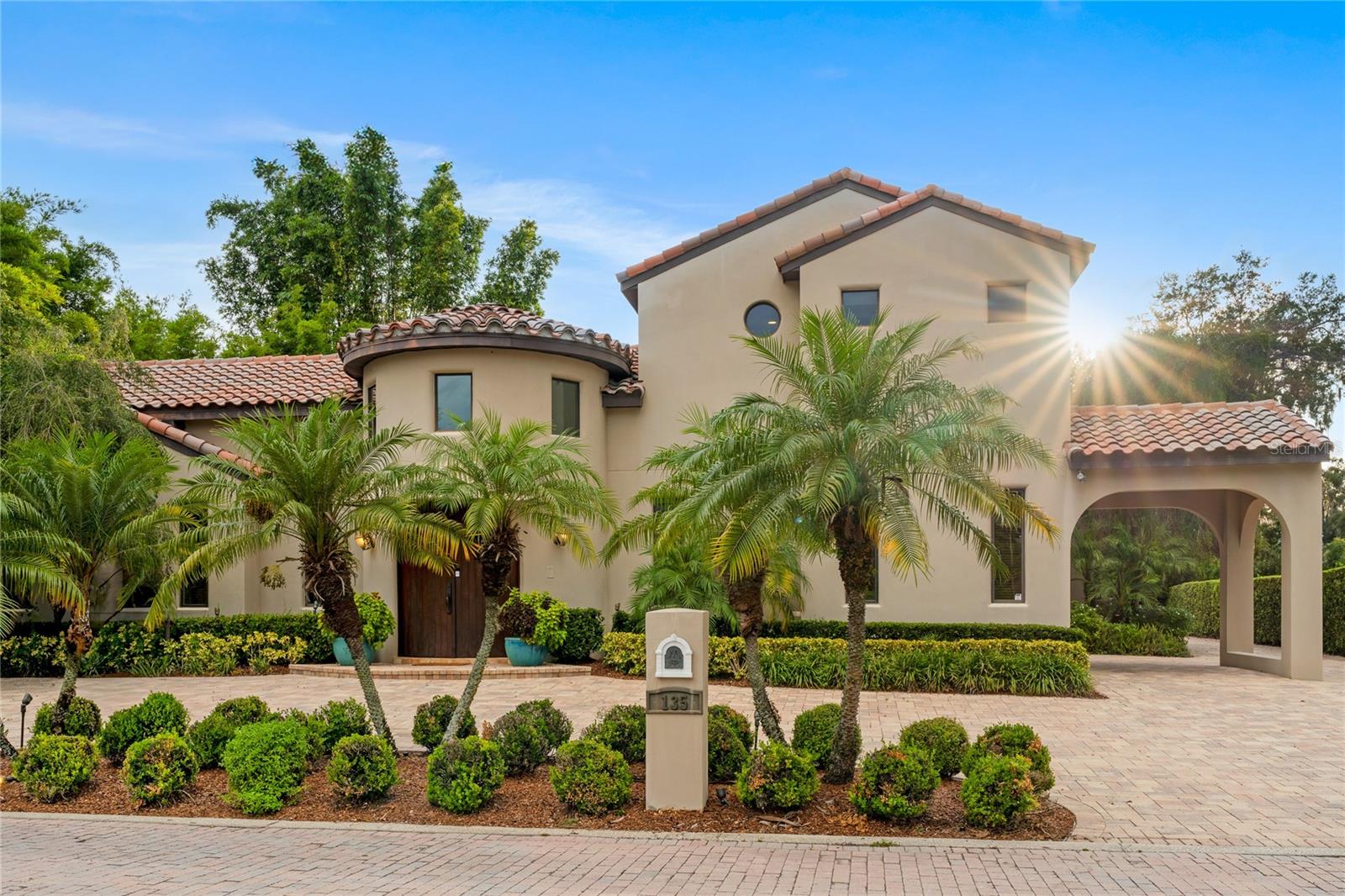 ACTIVE on the Market – Enhanced and Priced to Sell!
Custom built in 2003 and secluded in an exclusive enclave of only six exquisite luxury homes, this 5-bedroom, 4.5-bath Mediterranean-style residence offers privacy, elegance, and an exceptional indoor-outdoor lifestyle. Designed around a stunning courtyard with sparkling pool, tropical landscaping, and outdoor lighting, almost every room on the main level has a door opening directly to this stunning outdoor space. The home delivers resort-style living every day.
The main level features the primary suite with an extraordinary custom-built walk-thru closet, a separate nanny/in-law bedroom, a dedicated library/office with custom built-in bookcase, & an expansive laundry and storage room. Upstairs, you’ll find two more bedrooms connected by a jack-and-jill bath, and a separate bath ensuite bedroom, plus a versatile loft/flex space perfect for games, study hub, or media.
Rich wood floors, a tile roof, owned solar panels, whole-house generator, irrigation well, and privacy fencing add comfort and efficiency to this remarkable home. The open gourmet kitchen and family room living spaces flow effortlessly to the pool and patio, ideal for both relaxed evenings and festive gatherings.
Located on a quiet cul-de-sac with no through traffic, this home offers seclusion yet remains close to premier shopping, dining, and top-rated schools. Don't miss the chance to own this distinctive Central Florida retreat! Call today for your private showing.
