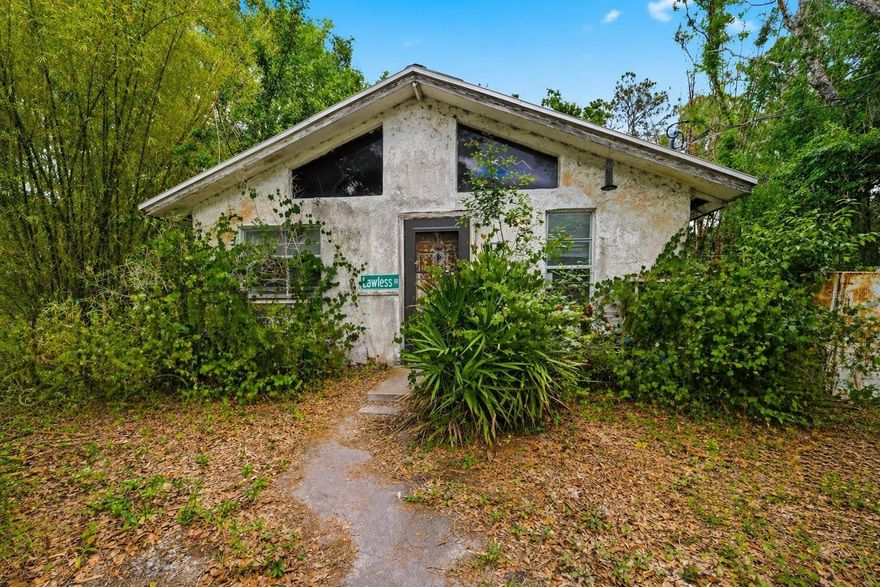 One or more photo(s) has been virtually staged. Single family residence with plenty of potential, situated on a little over a quarter of an acre and featuring 3 lots on 1 parcel!

This 1056 square foot, 2 bedroom, 1 bathroom home is ready for renovation and could be perfect for your next project. AR zoning allows for mobile home placement or a single family home, giving you flexible options whether you're looking for your next investment, rental property, replacement home, or a chance to create something of your own. Plenty of potential here for a buyer with vision.