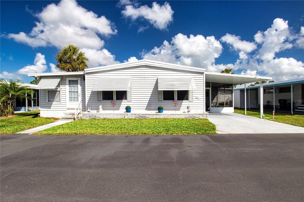Photo of 2235 Palazza Drive #81, Sarasota, FL 34238 (MLS # TB8552663)