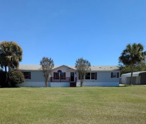 Photo of 1605 NW 109th Avenue, Ocala, FL 34482 (MLS # TB8553976)