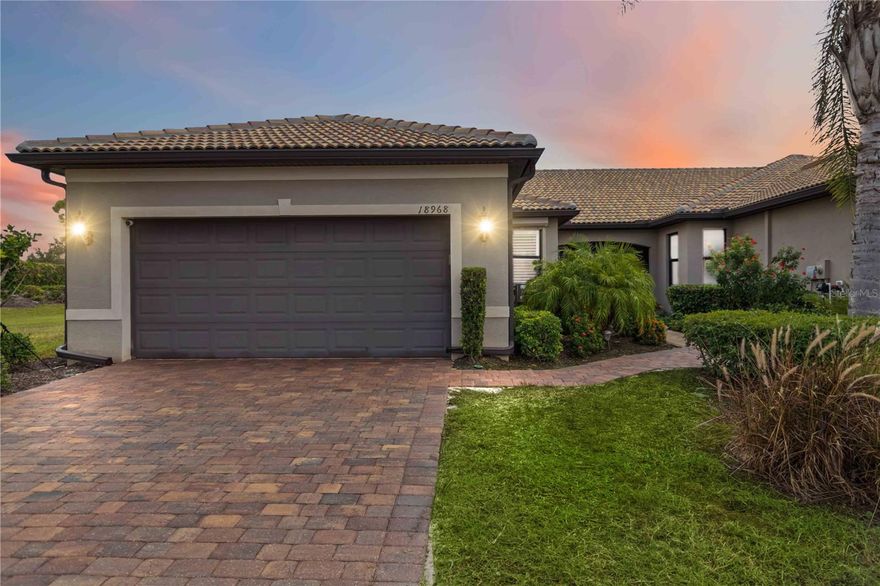 Welcome to IslandWalk, one of Venice’s premier resort-style communities! This TURNKEY FURNISHED Cascadia villa sits on a private cul-de-sac lot with extra green space and a peaceful lake view. Featuring 2 bedrooms, 2 baths, and a den, this upgraded home combines comfort, functionality, and Florida elegance. The open-concept layout offers tile flooring throughout, plantation shutters, and hurricane roll-downs on all windows and the lanai. The kitchen includes granite countertops, stainless steel appliances, bar seating, additional cabinetry, and a custom pantry—a true chef’s delight. The living area features custom built-ins and sliding doors leading to an extended screened lanai with panoramic lake views. The primary suite offers custom walk-in closets and a luxurious ensuite bath with dual sinks and stone countertops. A split floor plan provides privacy for guests, while the den serves perfectly as an office or extra bedroom. Enjoy morning coffee or sunrises from the lanai, complete with electric awning, panoramic screens, and hurricane roll-downs for extra protection. IslandWalk amenities include two resort-style pools, tennis and pickleball courts, a fitness center, clubhouse, dog park, and a full social calendar. Ideally located in Wellen Park, Close to Venice beaches, restaurants, and shopping.