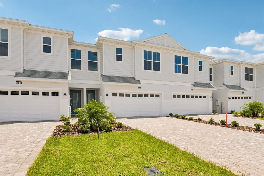 Photo of 31542 Azure Beach Drive, San Antonio, FL 33576 (MLS # TB8511615)