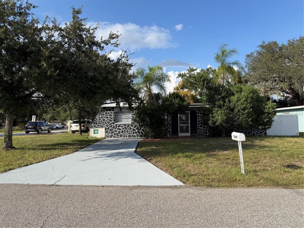 Photo of 5507 Forest Hills Drive, Holiday, FL 34690 (MLS # TB8436502)