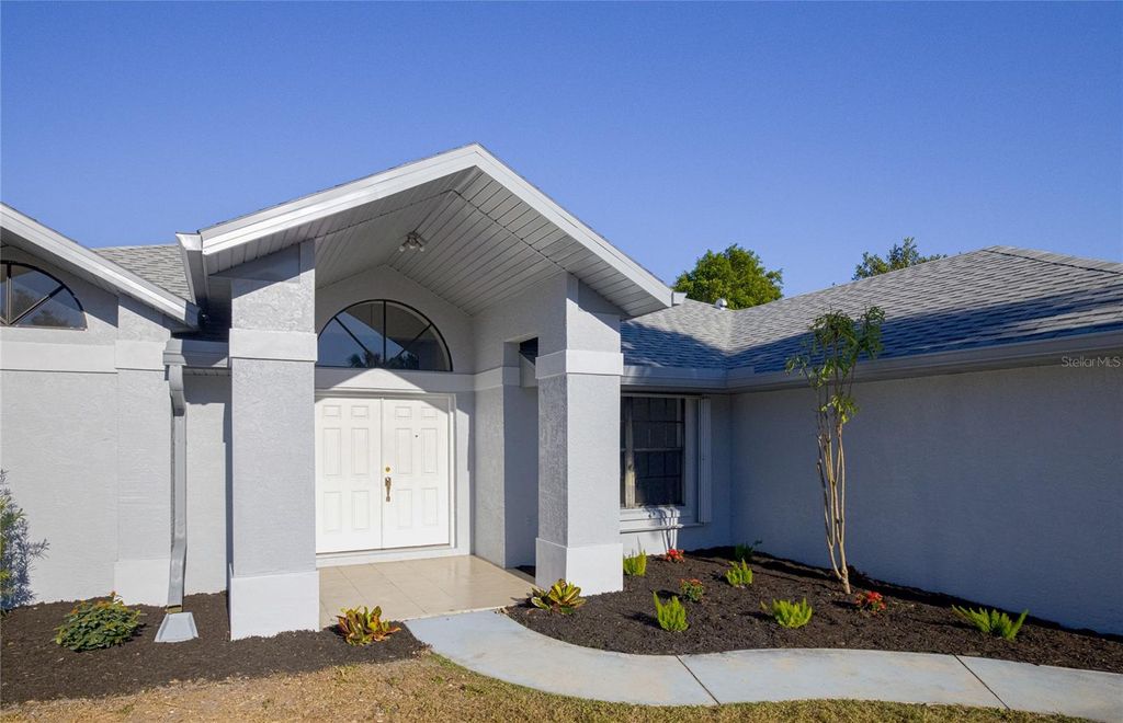 Photo of 1396 Hayworth Road, Port Charlotte, FL 33952 (MLS # D6145323)