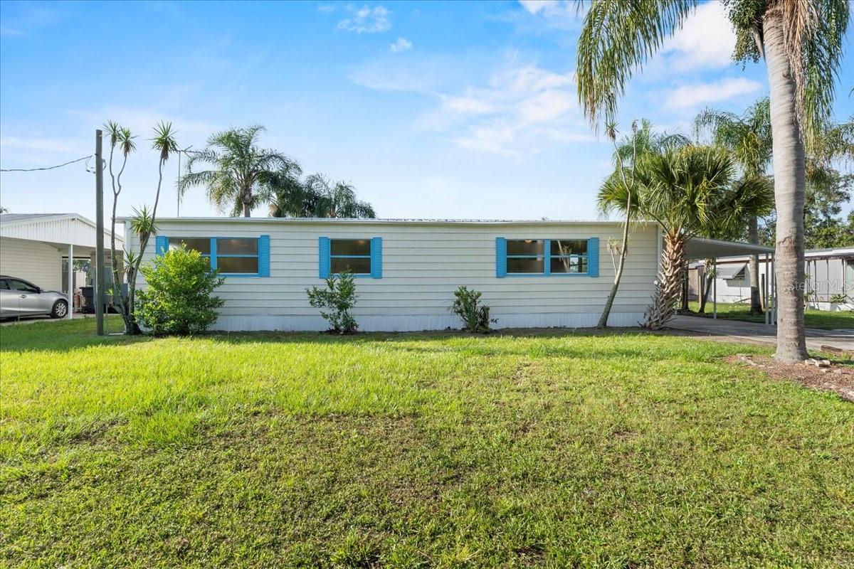Recently renovated manufactured home located in a quiet neighborhood with no HOA. This charming 2-bedroom, 2-bathroom home offers comfortable living and a low-maintenance lifestyle. Enjoy peace of mind with a new roof and recent updates throughout the interior. The open layout provides a spacious living and dining area, ideal for entertaining or relaxing. The kitchen features ample cabinet space and natural light. Both bedrooms are generously sized, each with its own bathroom for added privacy and convenience. The primary suite includes a walk-in closet and private bath. Fresh finishes and clean lines give the home a bright, modern feel. Step outside to a screened back porch, perfect for enjoying morning coffee or evening breezes. The large lot offers space for outdoor activities, gardening, or future customization. Located near shopping, dining, and local attractions in Haines City. Easy access to major roads makes commuting a breeze. Ideal as a primary residence, seasonal home, or investment opportunity. Move-in ready and waiting for its next owner.