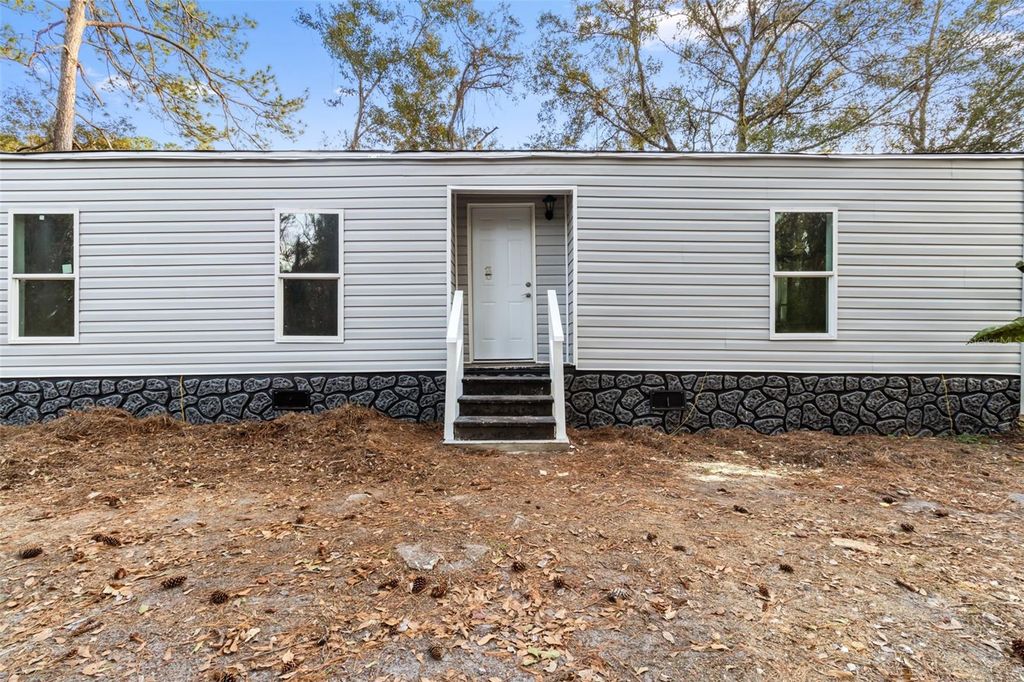 Photo of 18186 Ferry Avenue, Brooksville, FL 34604 (MLS # TB8468250)