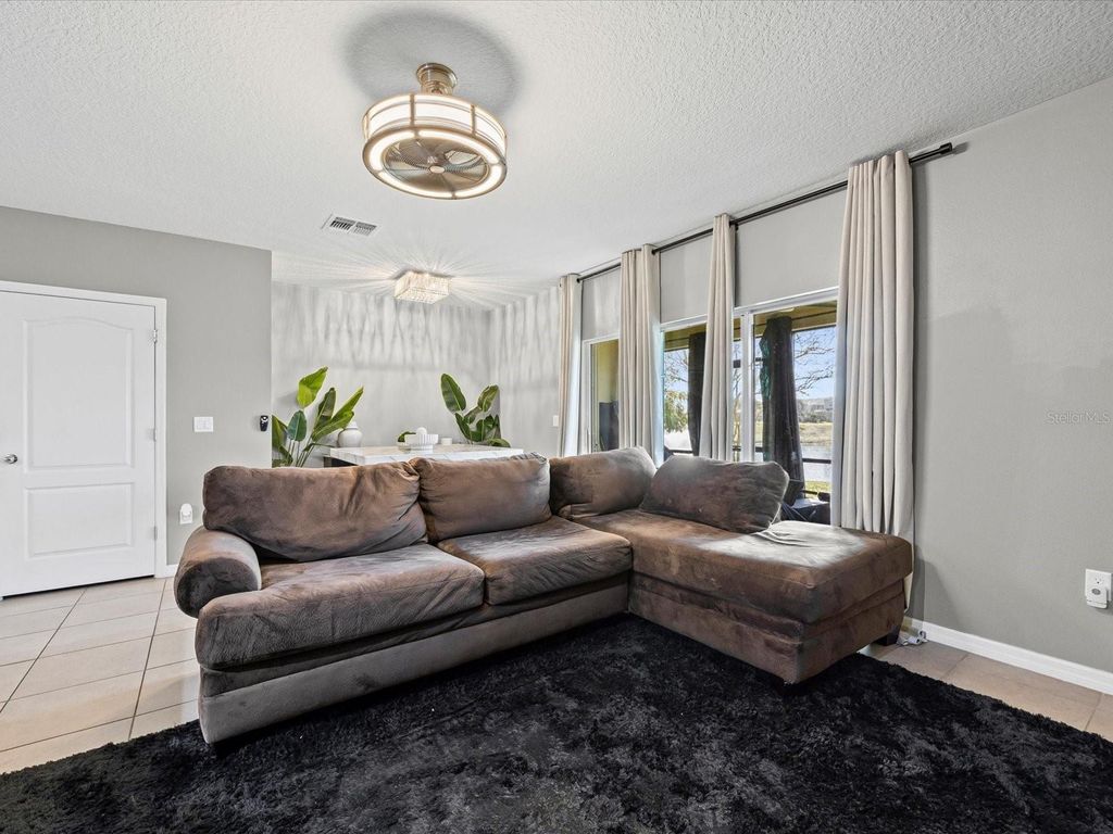 Photo of 347 Arbor Lakes Drive, Davenport, FL 33896 (MLS # TB8457144)