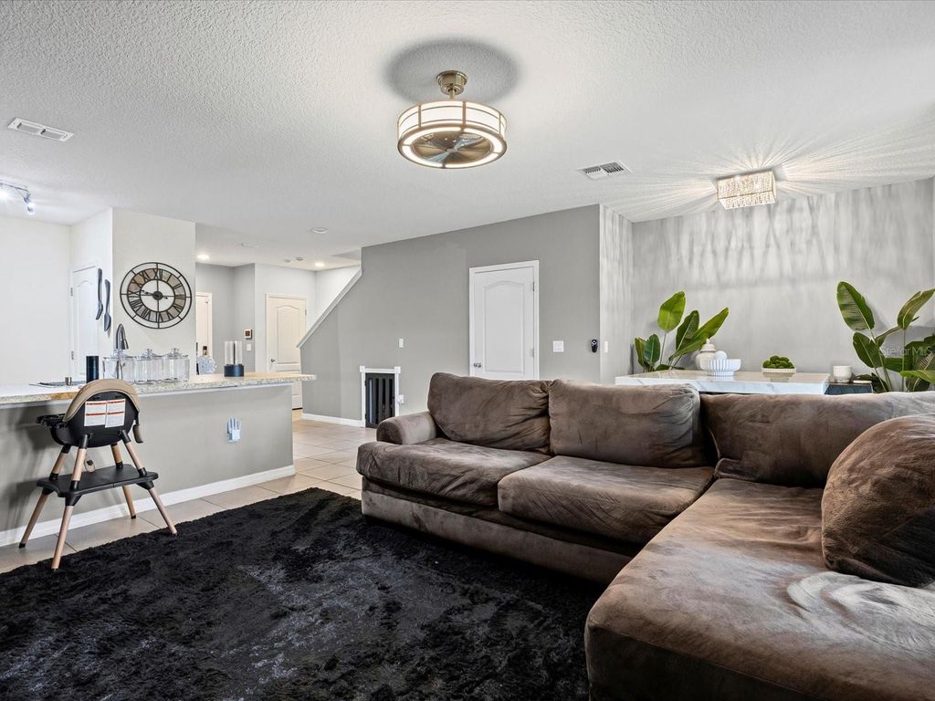 Photo of 347 Arbor Lakes Drive, Davenport, FL 33896 (MLS # TB8457144)